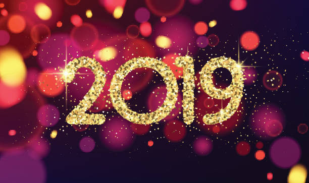 istock Golden shiny 2019 New Year sign on blurred background. 1053033986