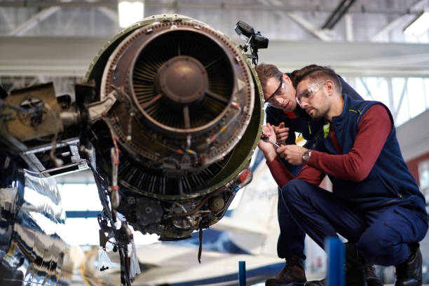 istock Aircraft mechanics in the hangar 1053034904