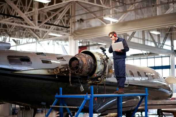istock Aircraft mechanic in the hangar 1053034920