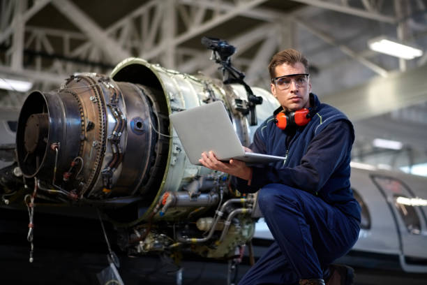 istock Aircraft mechanic in the hangar 1053036018