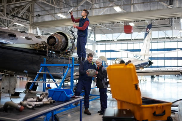 istock Aircraft mechanics in the hangar 1053036162