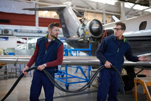 istock Aircraft mechanics in the hangar 1053036472