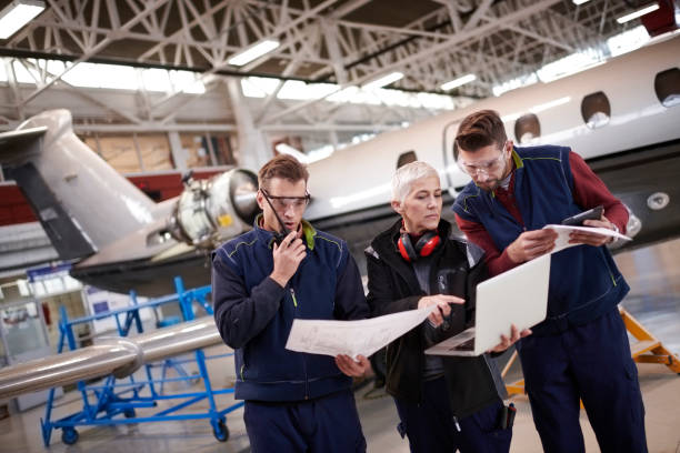 istock Aircraft mechanics in the hangar 1053036474