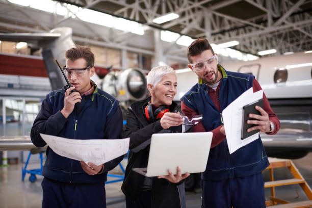 istock Aircraft mechanics in the hangar 1053036572