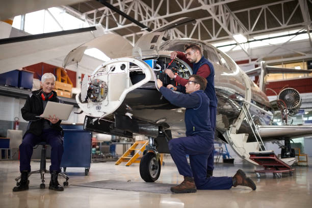 istock Aircraft mechanics in the hangar 1053036716