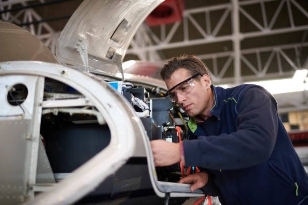istock Aircraft mechanic in the hangar 1053036770