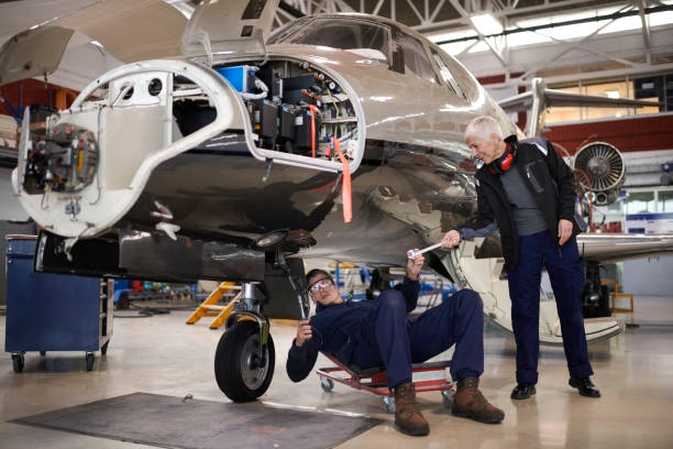 istock Aircraft mechanics in the hangar 1053036902