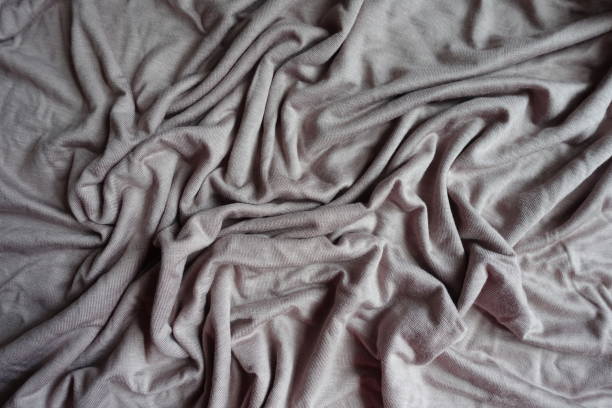 istock Crumpled simple grey viscose fabric from above 1053041096