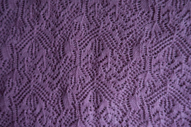 istock Delicate pink handmade knitted lace from above 1053041400
