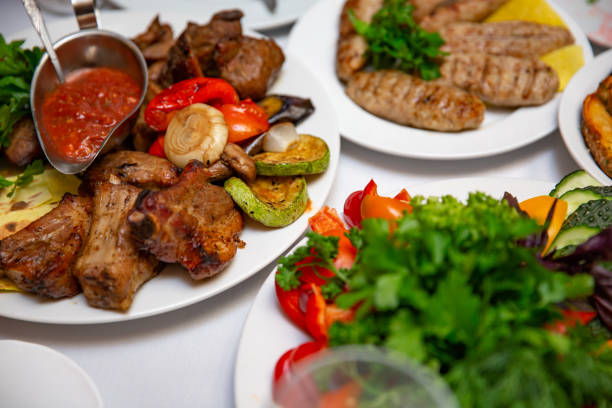 istock the barbecue with sauce and fresh vegetables 1053045624