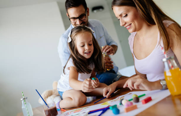 istock Happy familiy spending fun time at home 1053046044