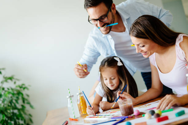 istock Happy familiy spending fun time at home 1053046066