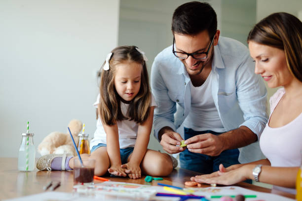 istock Happy familiy spending fun time at home 1053046070