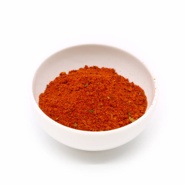istock spices for meat and fish in a white ceramic cup, isolated 1053046106