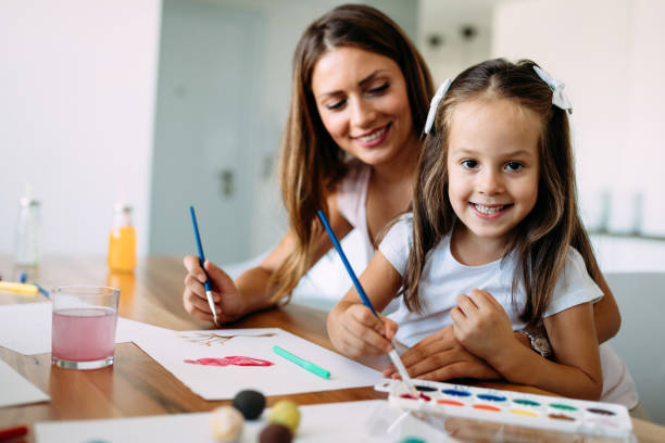 istock Happy family having fun time at home 1053046588