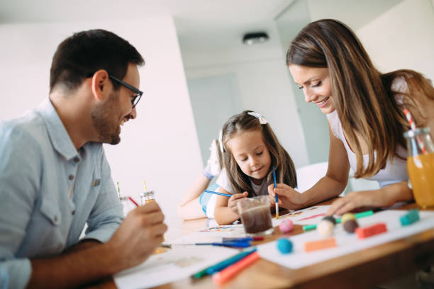 istock Happy family having fun time at home 1053046590