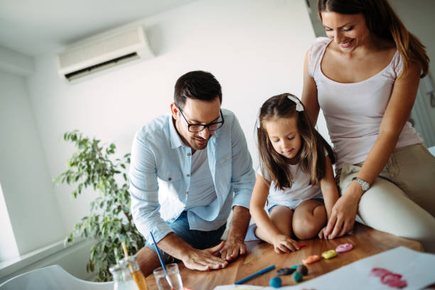 istock Happy family having fun time at home 1053046604