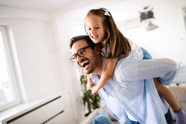 istock Happy family having fun time at home 1053046656
