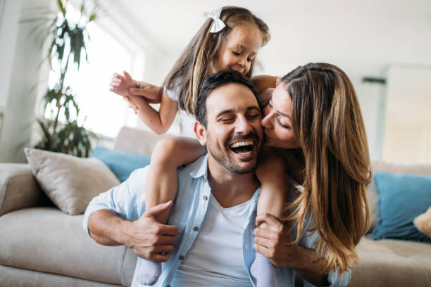 istock Happy family having fun time at home 1053047728