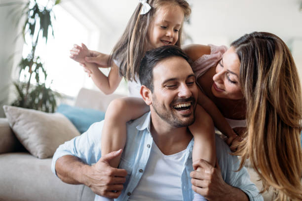 istock Happy family having fun time at home 1053047730