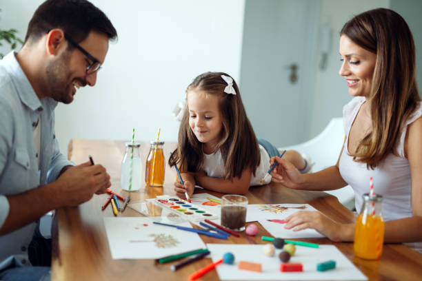 istock Happy family having fun time at home 1053047768
