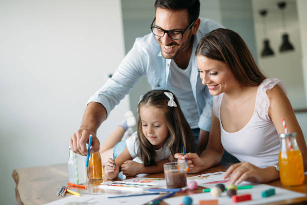 istock Happy family having fun time at home 1053047772