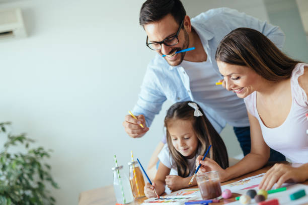 istock Happy family having fun time at home 1053047774