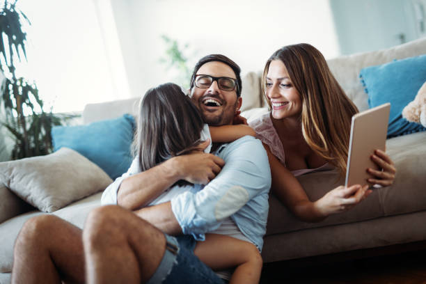 istock Happy family having fun time at home 1053047800