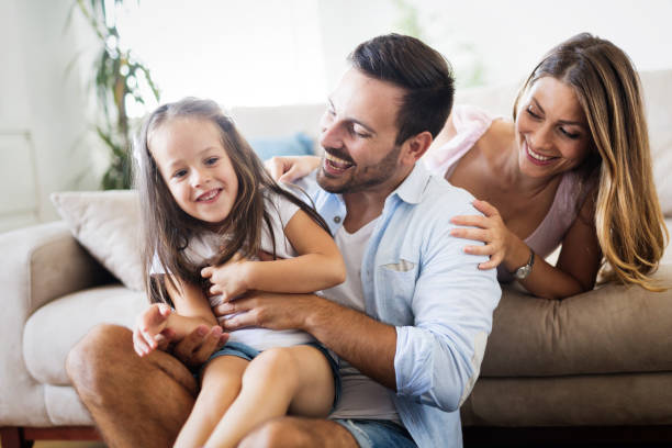 istock Happy family having fun time at home 1053047810