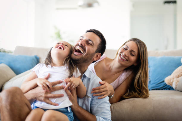 istock Happy family having fun time at home 1053047812