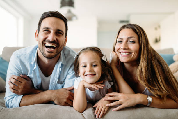 istock Happy family having fun time at home 1053047968