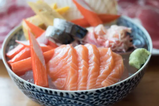 Crab Stick Salmon Sashimi Japanese Food Set and sweet egg and beef background