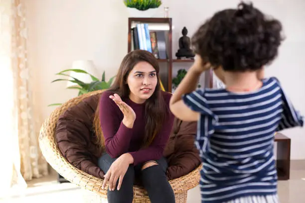 Photo of Mother scolding her daughter