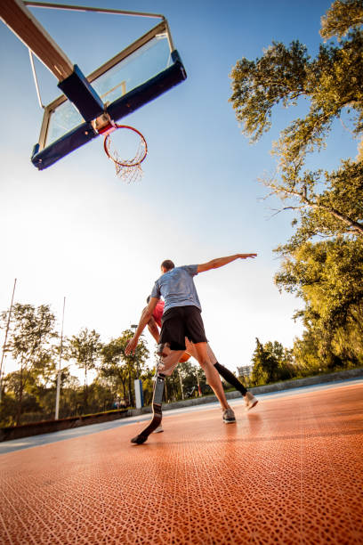 istock Friends playing basketball 1053051332