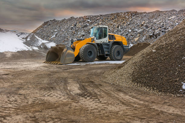 istock An excavator in a mine with rock for further processing 1053053312