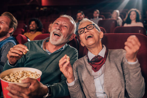 istock Couple laughing at cinema 1053060684