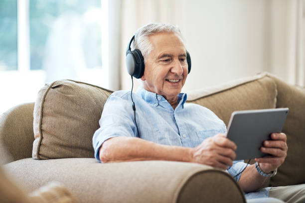 istock Relaxing with his favourite shows 1053060750