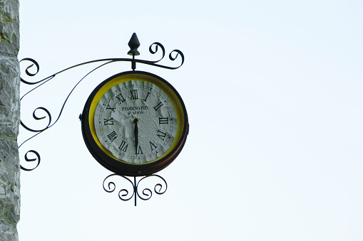 Old fashioned wall clock with \