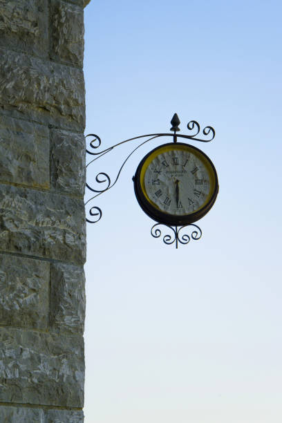 istock Old fashioned wall clock with 
