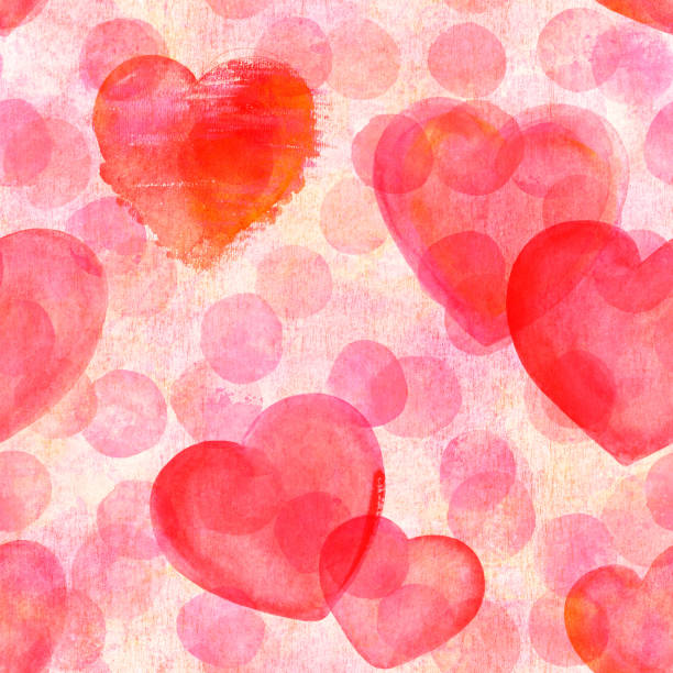 istock Seamless pattern of watercolor hearts on pink dots, Valentine day print 1053062958