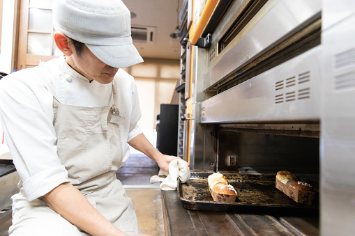 Japanese baker making bread