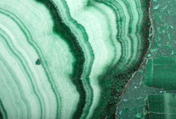 istock macro of green malachite wave texture 1053064854