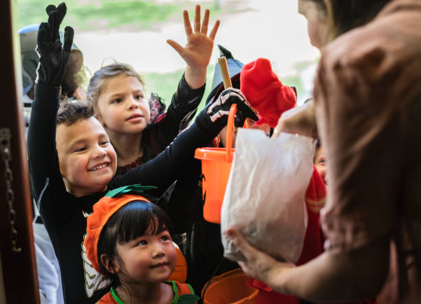istock Little children trick or treating on Halloween 1053064928