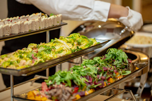 istock Variety of fresh salads in a buffet 1053065202