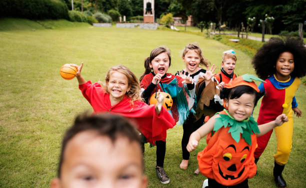 istock Little kids at a Halloween party 1053067274