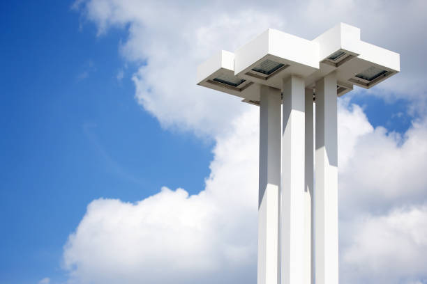large white modern street lamp on blue sky background