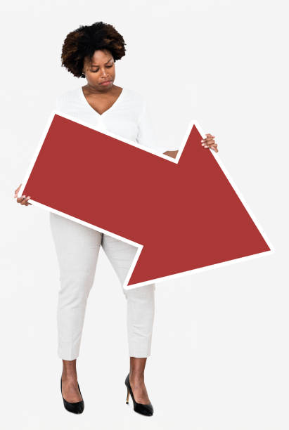 An unhappy woman holding a red arrow