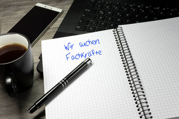 istock A computer, smartphone and booklet with the slogan We are looking for workers 1053071640