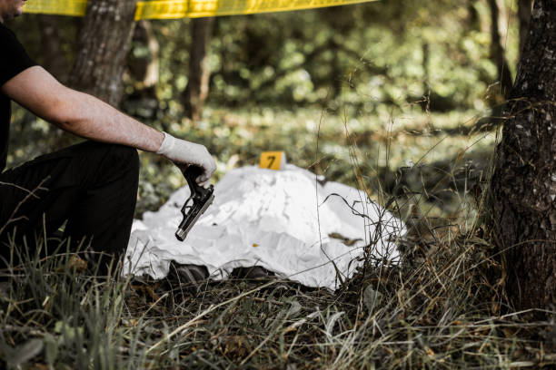 istock Gun at the crime scene 1053073500