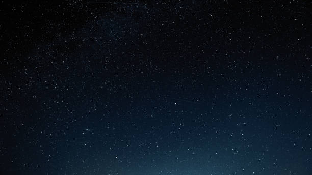 istock Night sky with stars and galaxy in outer space, universe background 1053075488